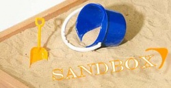 Look!  gave me a shovel and a pail! Now I have a shovel and a pail! And some sand!